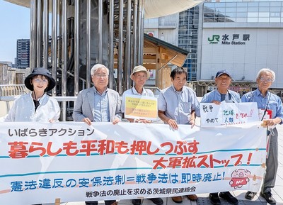19行動への参加者たちとアピールする江尻氏